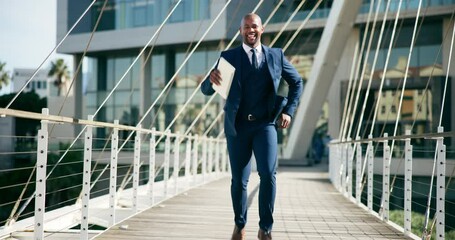 Dance, city and happy business black man excited with good news, career promotion and bonus. Corporate, professional and person in urban town on bridge jump for success, celebration and freedom