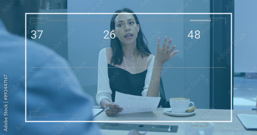 Canvas Prints Image of processing data over biracial businesswoman talking at office meeting