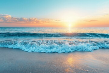Obraz premium Foamy Wave Crashing on Sandy Beach at Sunset