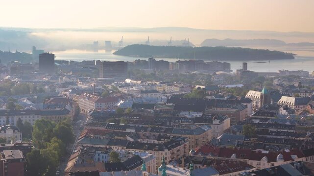 Sunrise aerial trucking view over Frogner borough toward Oslofjord, Oslo, Norway