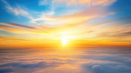 Fototapeta premium Glowing Sunset Over Misty Clouds Above the Sea