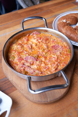 Turkish Menemen omelet in a frying pan. .