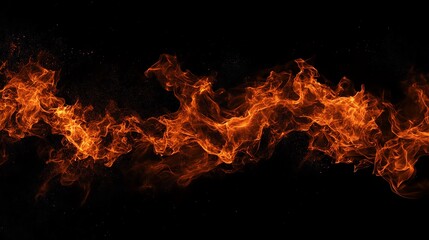 Fototapeta premium Vibrant flames dancing elegantly against a black backdrop, capturing the essence of heat and intensity in a visually striking way.