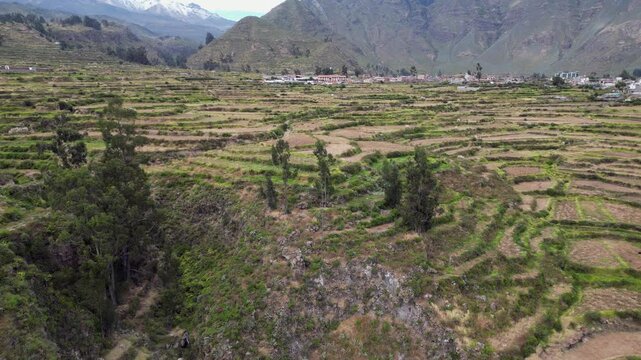 Low flight up terraced slope toward Cabanaconde in Colca Canyon Peru