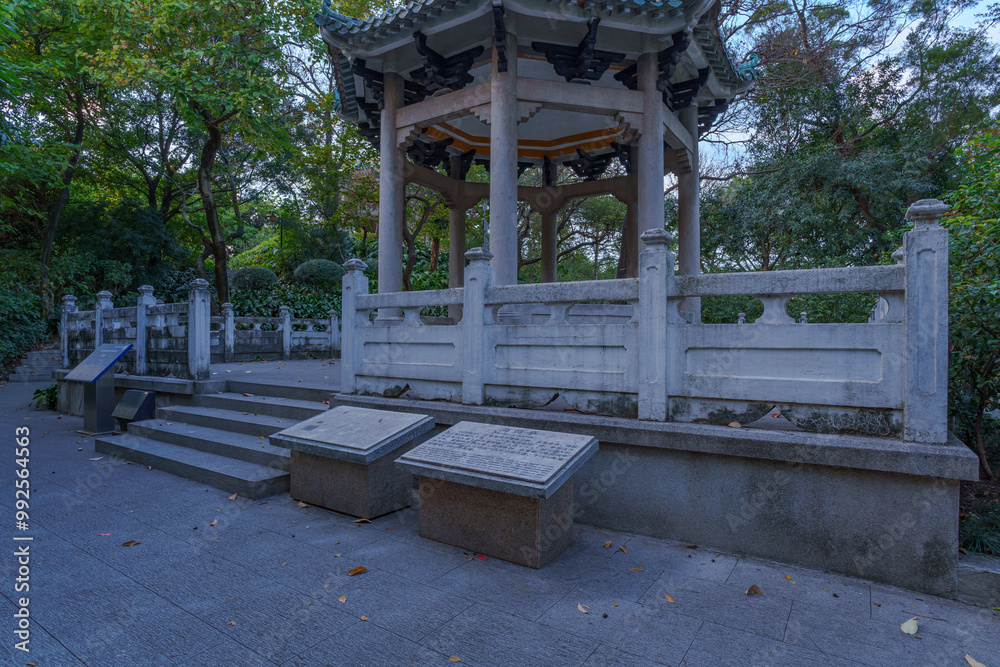 Wall mural Traditional Chinese architectural pavilion in the park