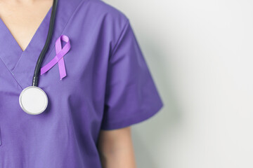 Doctor holding purple Ribbon for Violence, Pancreatic, Esophageal, Testicular cancer, Alzheimer,...