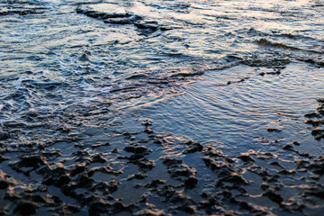 Waves, splashes of water. Dramatic sky after a storm, epic seascape. Sailing in inclement weather. Israel.