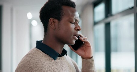Black man, phone call and frustrated in office for conflict, crisis and unfair dismissal. Disappointed, male intern and mobile at window for conversation, stress and anxiety with argument in city - Powered by Adobe