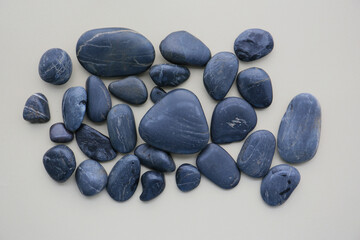 smooth black color stones, simple background