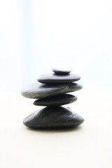 smooth black color stones, simple background