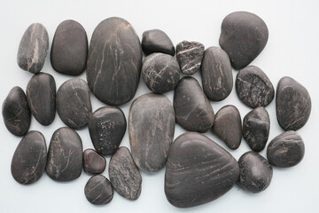 smooth black color stones, simple background