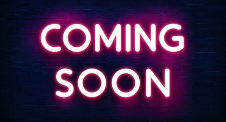 Obraz premium coming soon word lettering glowing with neon light on dark brick wall background