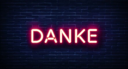Obraz premium danke word lettering glowing with neon light on dark brick wall background