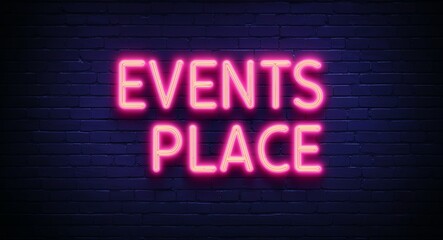 Obraz premium events place word lettering glowing with neon light on dark brick wall background