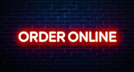 Fototapeta premium order online word lettering glowing with neon light on dark brick wall background