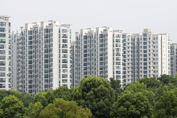 High-rise condo buildings in a residential compound near Hangzhou East Railway Station. The Chinese real estate industry remains in a correction trajectory.