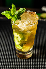 Refreshing mojito cocktail made with rum and mint in a luxurious bar in Colombia.