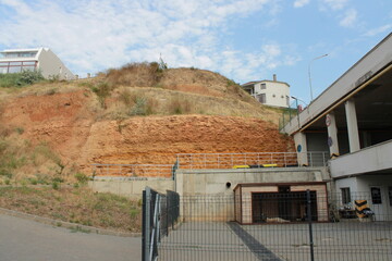 Clay mountain close-up. House on the mountain.