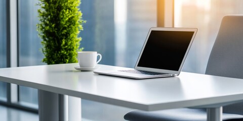 Fototapeta premium Modern Office Workspace with Laptop and Coffee