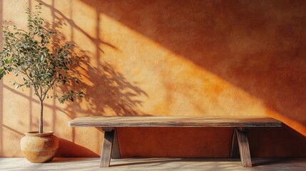 Empty table against a bright brown wall with organic shadows