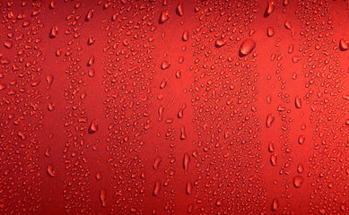 Liquid Drops On Glance Intense Red Surface. Stock Photo For Red Droplets Background
