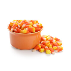 Bowl of Halloween candies isolated on white background