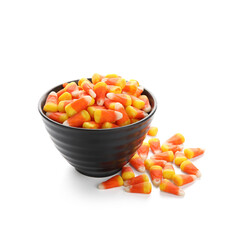 Bowl of Halloween candies isolated on white background