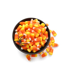 Bowl of Halloween candies isolated on white background