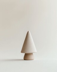 A minimalist mockup showcasing a single, hand-carved wooden Christmas tree ornament with a simple, geometric design, set against a crisp white backdrop to allow the craftsmanship t