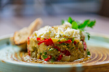 delicious fresh salad. salad with tomatoes, cucumbers and other vegetables with toasted bread and looking great.