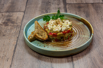 delicious fresh salad. salad with tomatoes, cucumbers and other vegetables with toasted bread and looking great.