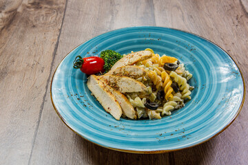 mushroom risotto and spaghetti tagliatelle with pieces of mushrooms.