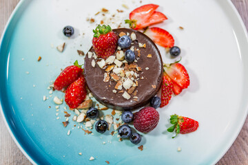 a plate of beautiful looking delicious dessert. 
