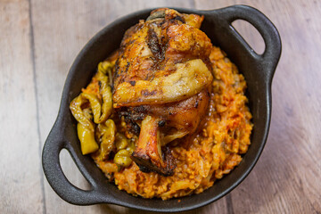 a plate with a beautiful meat dish and cooked vegetables. 