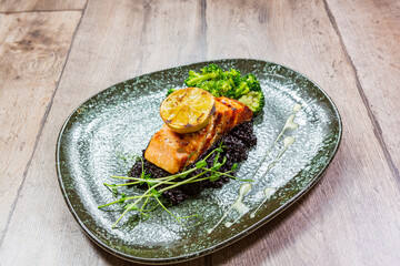 portion of salmon with garnish. sea ​​food. shrimp with vegetables. 