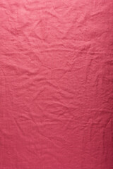 stonewashed linen fabric in dark pink color