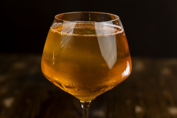 cold apple juice drink in a clear glass