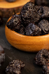 ripe purple plums and dried plums