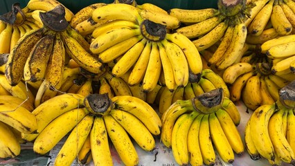 Bananas and fruits for sale in the market.A bunch of fresh and ripe fruits are for sale .Fruits...