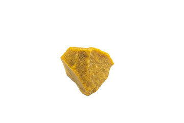 Unique yellow stone with distinct shape and texture displayed on a clean white background