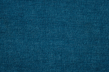 Textured blue fabric background showcasing a rich denim weave perfect for design projects