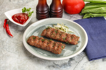 Kebab with beef served onion