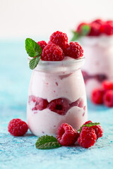 Jars of homemade raspberry yogurt.