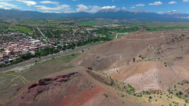 Collegiate Peaks 14ers S Mountain Tenderfoot Hill Salida Colorado aerial drone forward motion Buena Vista Rocky mountain town Chaffee County USA Arkansas River hiking trails blue sky sunny day