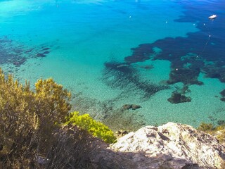 hidden cove with rock beach on the island of Ibiza. High quality photo