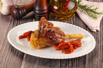 Baked lamb shank with vegetables