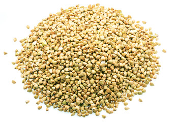 Hulled kernels of unroasted buckwheat isolated on white background.