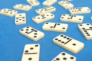 Dominoes bones on blue background	