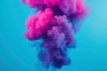 Fototapeta premium Abstract Swirling Pink and Purple Ink in Blue Water