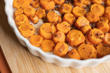 Delicious Garlic Butter Parmesan Carrots in a White Tray Ready to Eat – The Perfect Holiday Side Dish Close-Up